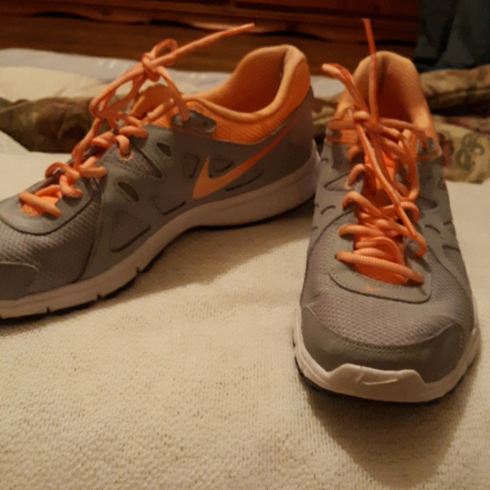 Grey and orange nikes